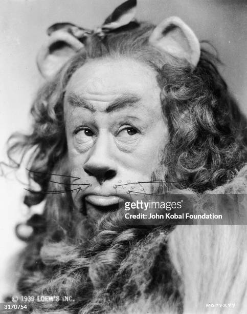 Bert Lahr in costume as the cowardly lion in the musical 'The Wizard of Oz', directed by Victor Fleming for MGM.