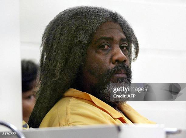 Accused murderer Marcus Wesson makes an appearance in court 30 March 2004 in Fresno, California. The laywers for Wesson, who was arraigned for the...