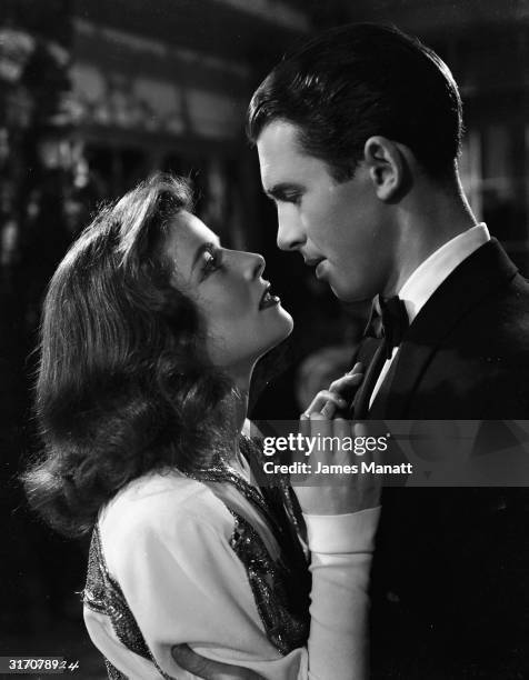 Katharine Hepburn and James Stewart play a spoilt heiress and the reporter sent to cover her wedding in 'The Philadelphia Story', directed by George...