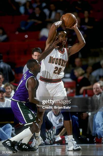 Forward LaPhonso Ellis of the Denver Nuggets in action against the Milwaukee Bucks during a game at the McNichols Sports Arena in Denver, Colorado....