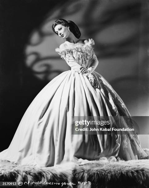 American actress Loretta Young in period dress for her role as Lina Varsavina in 'The Men in her Life' directed by Gregory Ratoff for Columbia...