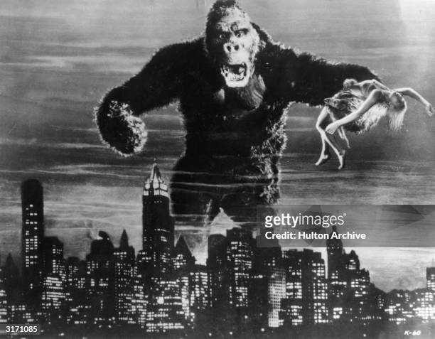 One of John Cerisoli's models of the giant ape, poised above the New York skyline in a scene from the classic monster movie 'King Kong'. In one of...