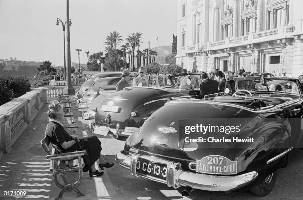 Some of the cars taking part in the Monte Carlo Rally outside the casino in Monte Carlo where they have been entered in an 'elegance' competition....