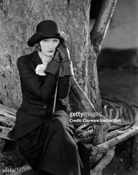 Swedish-American actress Greta Garbo plays Anna Karenina in the romantic drama 'Love', directed by Edmund Goulding.