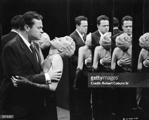 Orson Welles and Rita Hayworth become involved in a complex murder plot in 'The Lady From Shanghai', a film noir directed by Welles himself.