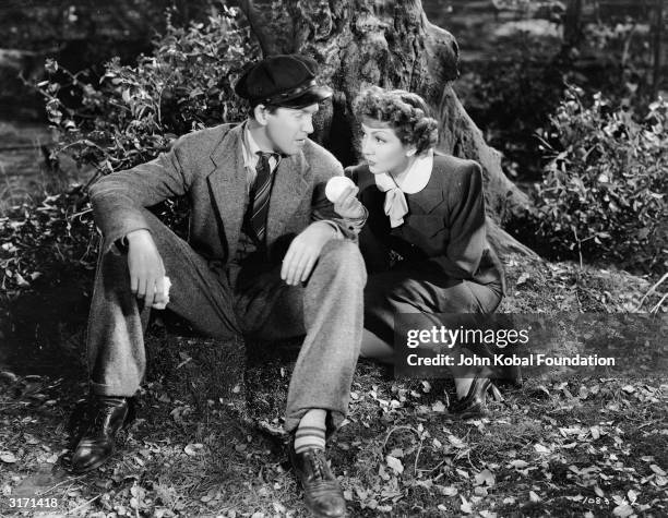 James Stewart and Claudette Colbert , as Edwina Corday and Guy Johnson in the MGM screwball comedy 'It's a Wonderful World' directed by W S Van Dyke.