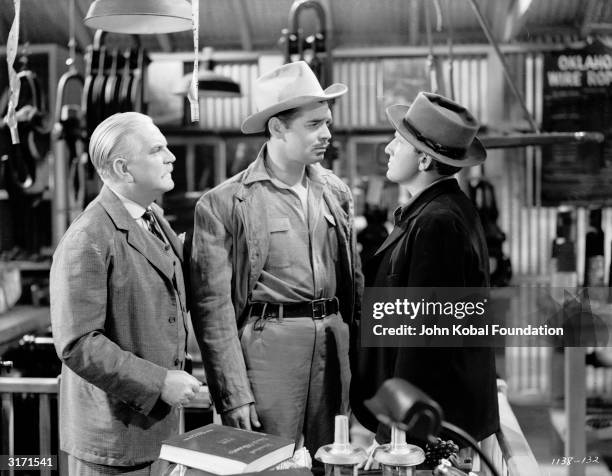 From left to right, Frank Morgan , Clark Gable and Spencer Tracy are the volatile stars of 'Boom Town', directed by Jack Conway.