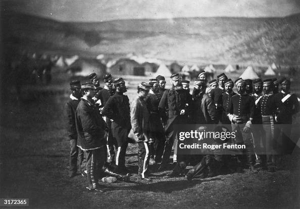 Col Doherty Members of the British 13th Light Dragoon surround Colonel Doherty as ...