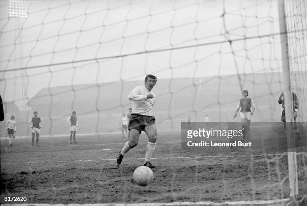 Spurs skipper Alan Mullery scoring his team's third goal following a penalty kick in the third round FA Cup match against Sheffield Wednesday at...