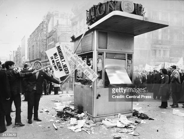 Newspaper kiosk is testament to the violence as Brussels is witness to the worst rioting in its history as 80,000 protesting farmers from various EEC...