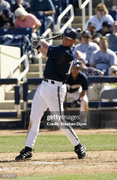 Lyle Overbay of the Milwaukee Brewers bats during their spring training game against the Texas Rangers on March 7, 2004 at Maryvale Baseball Park in...