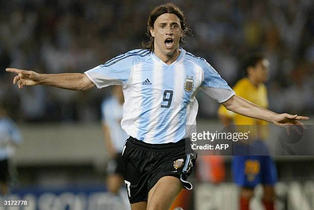 Argentine Hernan Crespo celebrates after scoring the first goal against Ecuador 30 March 2004 at the Monumental stadium in Buenos Aires, Argentina,...