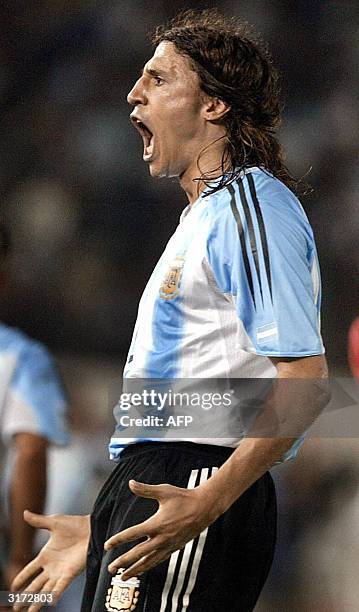 Argentine Hernan Crespo celebrates after scoring the first goal against Ecuador 30 March 2004 at the Monumental stadium in Buenos Aires, Argentina,...