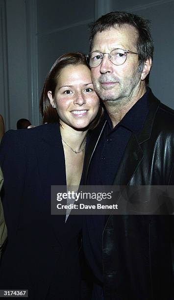 American guitarist Eric Clapton and wife attend the cocktail party to celebrate "Giorgio Armani Retrospective" at the Royal Academy on October 14,...