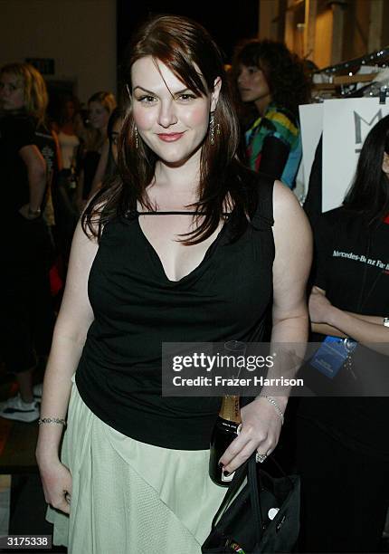 Actress Sara Rue backstage during the Custo Barcelona show at Mercedes-Benz Fashion Week held at Smashbox Studios, March 30, 2004 in Culver City,...