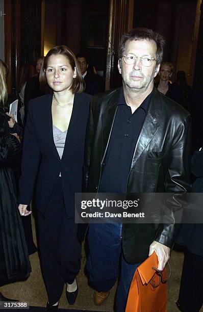 American musician Eric Clapton and wife Melia Mcennery attend the cocktail party to celebrate "Giorgio Armani: A Retrospective" at the Royal Academy...