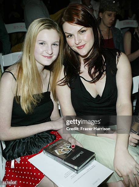 Lea Rue and actress Sarah Rue attend the Custo Barcelona show at Mercedes-Benz Fashion Week held at Smashbox Studios, March 30, 2004 in Culver City,...