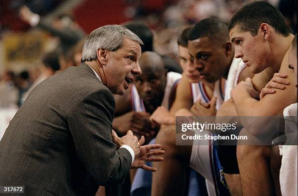 Coach Roy Williams of the Kansas Jayhawks talks to his team during an NCAA tournament game against the Prairie View Panthers at the Myriad in...