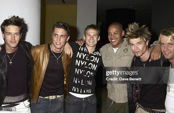 Boy-bands 'Phixx' and 'Blue' arrive at the After-Party for the UK Premiere of 'X-Men 2' at St Martin's Lane Hotel on April 24, 2003 in London.