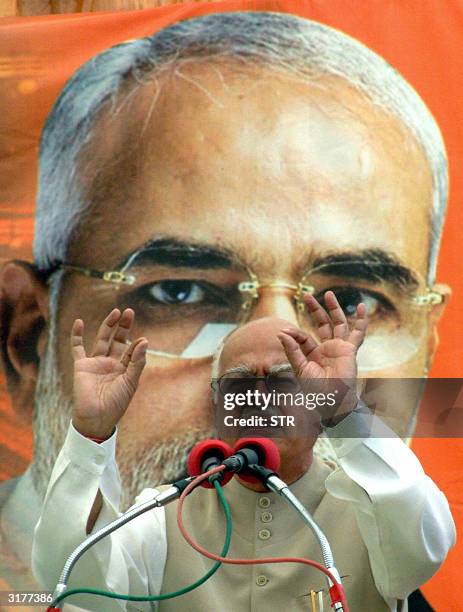 India's Deputy Prime Minister L.K. Advani gestures as he addresses an election rally in Viramgam, some 70kms west of Ahmedabad, 31 March 2004. Advani...