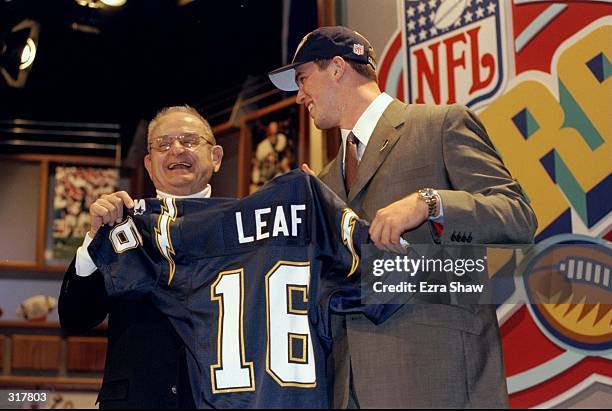 Quarterback Ryan Leaf stands with owner Alex Spanos of the San Diego Chargers during the NFL draft at Madison Square Garden in New York City, New...