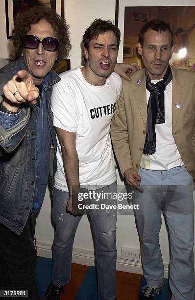Designer Mick Rock, Jim Fallon and Marlon Richards attend the opening of Mick Rock's designer fashion label in "Zoltan" in Soho, London. The shop...