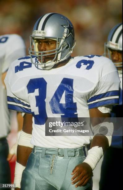 Running back Herschel Walker of the Dallas Cowboys looks on during a game against the New England Patriots at Foxboro Stadium in Foxboro,...