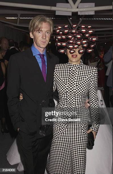 Phillip Treacy and Isabella Blow attend the 2003 Lycra British Style Awards at Old Billinsgate Market on September 26, 2003 in London.