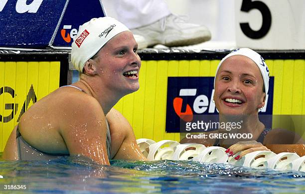 Leisel Jones , with Brooke Hanson alongside, smiles after winning the final of the Women's 200m Breaststroke at the Australian Olympic trials in...