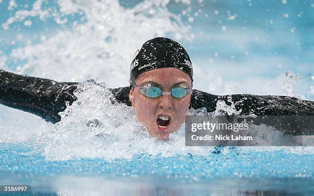 Petria Thomas of Australia in action in the 50m Butterfly semi final during day 6 of the Telstra Olympic Team Swimming Trials at the Homebush Aquatic...