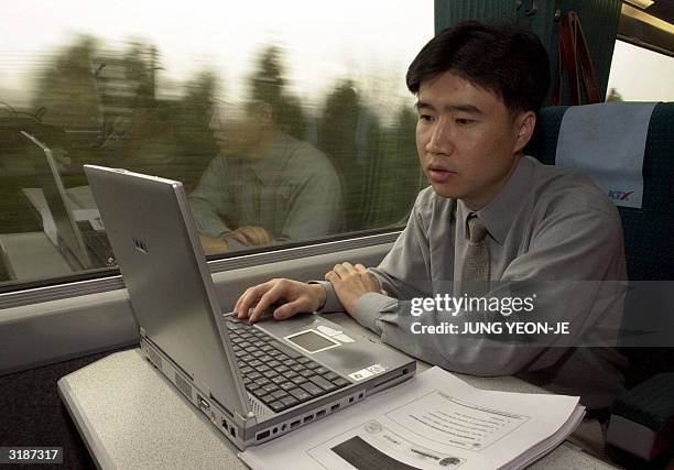 Korean Man Using Computer Korean Man Laptop Photos and Premium High Res Pictures - Getty Images