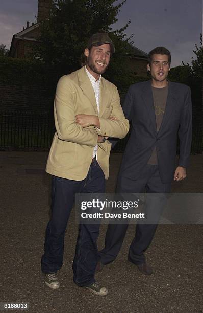 British socialites David and Anthony De Rothschild arrive at the party to celebrate the launch of Hillary Clinton's book "Hillary" thrown by Lynn De...