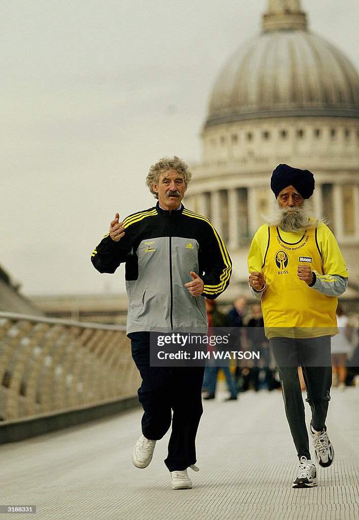 Ninty three-year-old Fauja Singh (R), th