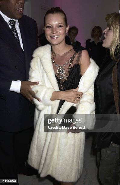 Model Kate Moss attends the Manolo Blahnik Exhibition at the Design Museum on January 30, 2003 in London.