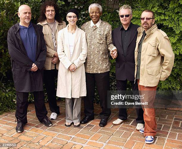 British musicians Peter Gabriel, Brian May, Annie Lennox, Roger Taylor and Dave Stewart visit Nelson Mandela's home outside Cape Town prior to the...
