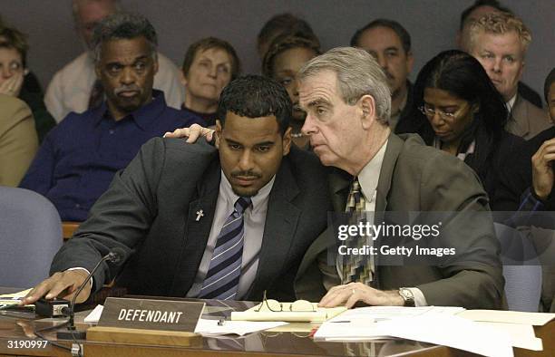 Former New Jersey Nets basketball player Jayson Williams talks with defense attorney Joseph Hayden during Williams' aggravated manslaughter trial at...