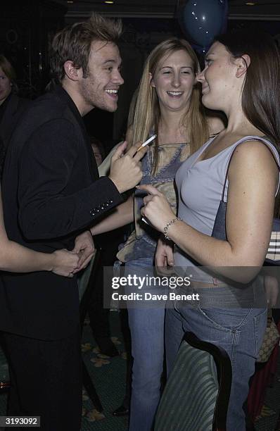 Singer, Will Young and guests attend the O2 Woman of The Year Awards, held at The Intercontinental Hotel on 29th November 2002, in London. .