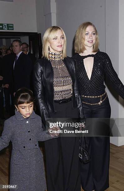 Singer, Madonna with daughter, Lourdes and Chelsea Clinton attend the launch of the Versace Retrospective Exhibition held at The Victoria and Albert...