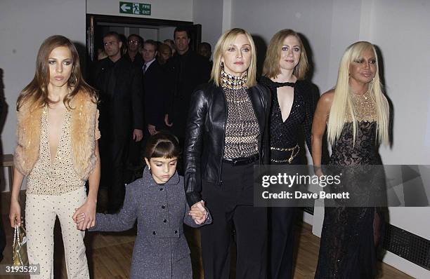 Allegra Versace , American singer Madonna with daughter, Lourdes, Chelsea Clinton, and Italian designer Donatella Versace attend the launch of the...