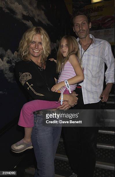 Keith Richards wife Pattie Hansen, with her daughter and Keiths son Marlon Richards, attend the Rolling Stones concert at the Astoria in London on...