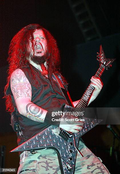 Heavy metal band guitarist "Dimebag" Darrell Abbott of Damage Plan performs on stage during MTV2 Headbangers Ball Tour on April 1, 2004 at the...