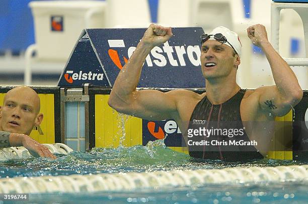 Brett Hawke celebrates winning the Men's 50 metre freestyle final during finals on day seven of the 2004 Telstra Olympic Team Swimming Trials held...