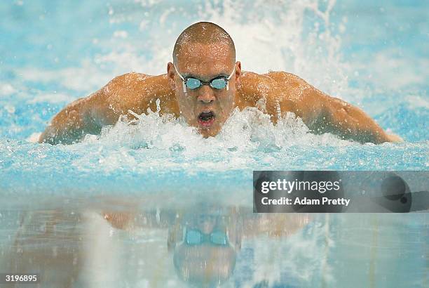 April 2: Geoff Huegill of Australia on his way to winning the mens 100m butterfly final during day 7 of the Telstra Olympic Team Swimming Trials at...