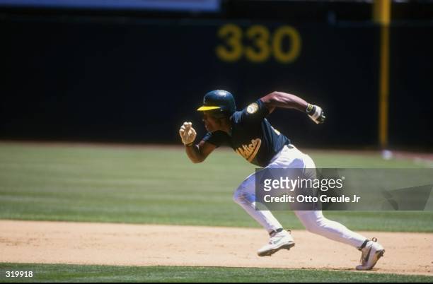 Outfielder Rickey Henderson of the Oakland Athletics in action during a game against the Anaheim Angels at the Oakland Coliseum in Oakland,...