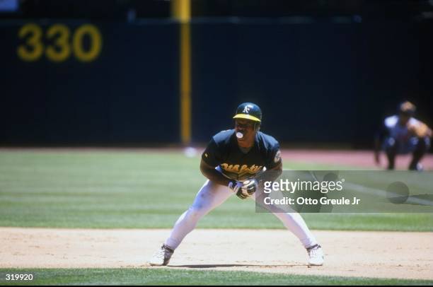 Outfielder Rickey Henderson of the Oakland Athletics in action during a game against the Anaheim Angels at the Oakland Coliseum in Oakland,...