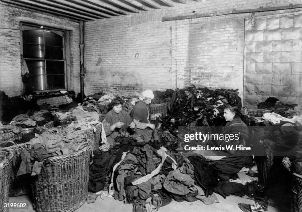 Sorting Rags 359 Pile Of Rags Stock Photos, High-Res Pictures, and Images - Getty Images