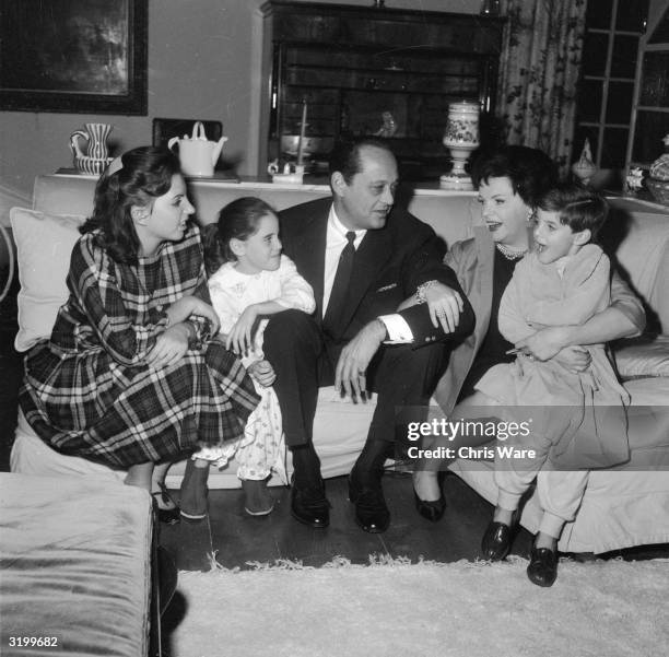 American film star, Judy Garland with her husband, film producer, Sid Luft and their children, Liza , Lorna and Joe at their home in Chelsea, London.