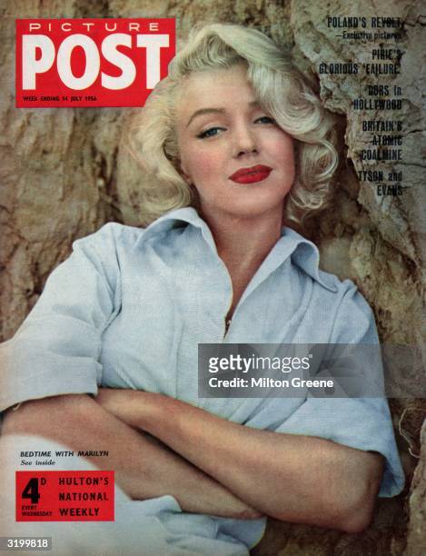 American actress Marilyn Monroe appears on the cover of Picture Post magazine in a pale blue shirt. Original Publication: Picture Post Cover -...