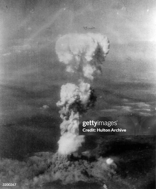 Aerial view of a mushroom cloud from an atomic blast rising over Hiroshima, Japan.