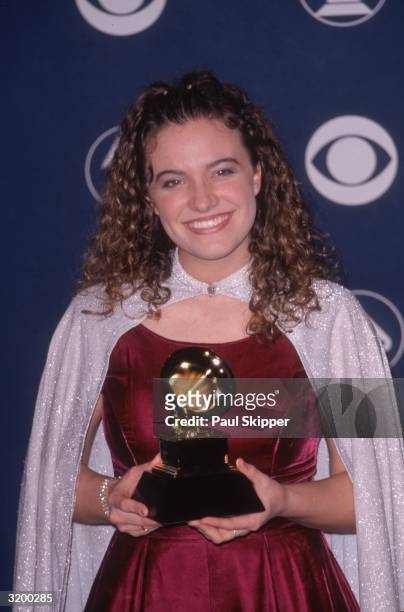 Gospel singer Rebecca St. James holds the Grammy award she won for Best Rock Gospel Album, entitled, 'Pray,' at the Staples Center, Los Angeles,...